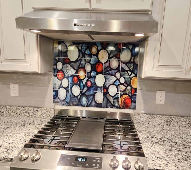 A custom produced kitchen backsplash which looks like stained glass "Stain-Glass-Tile-Kitchen-Backsplash"