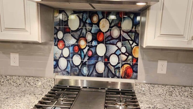 A custom produced kitchen backsplash which looks like stained glass "Stain-Glass-Tile-Kitchen-Backsplash"